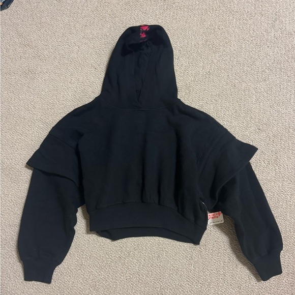 Free People Sweaters - NWT FREE PEOPLE SIZE XS BLACK MOTIF HOODIE